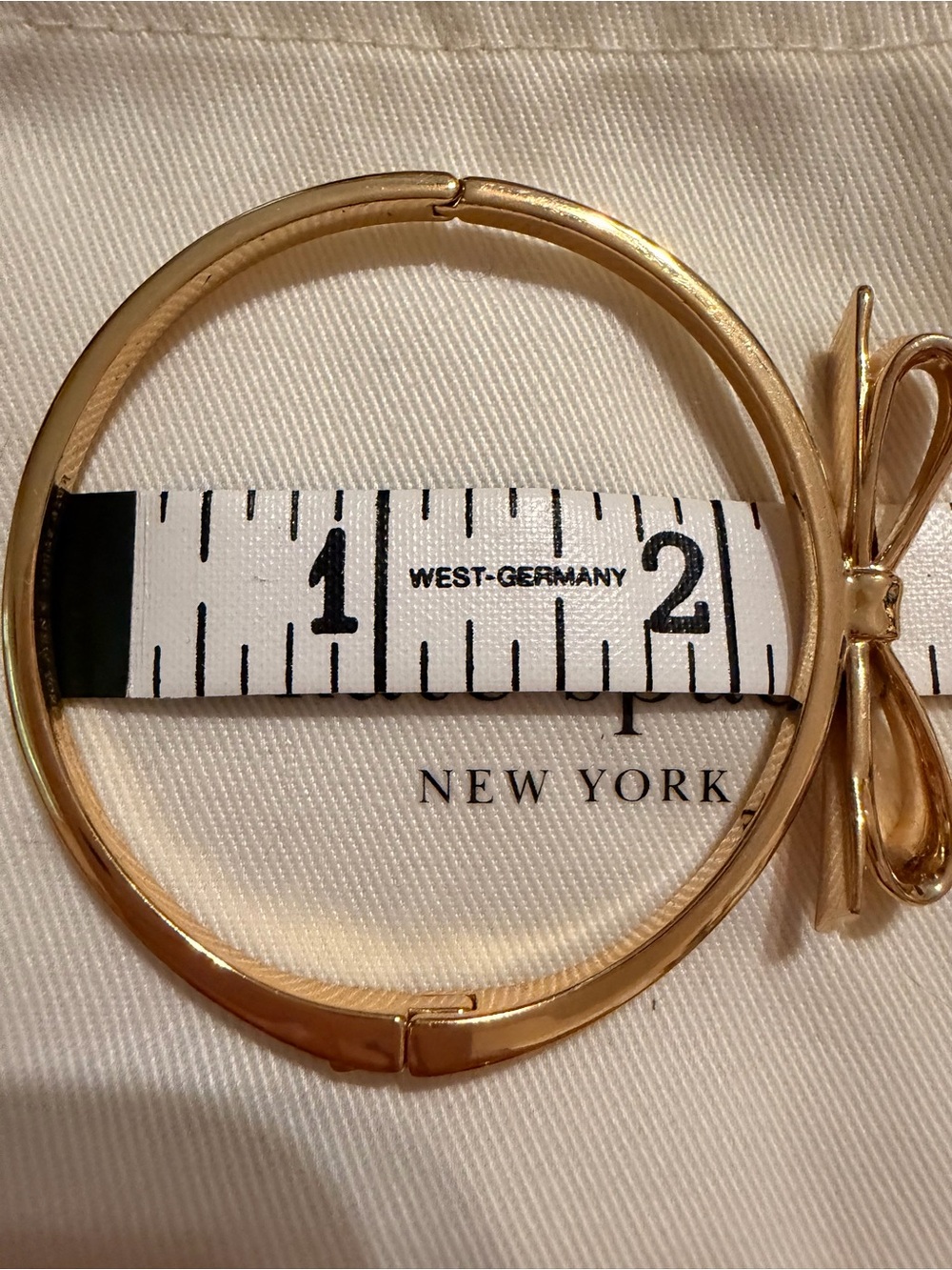 Kate Spade New York Gold Bow Bangle Bracelet - Picture 8 of 8